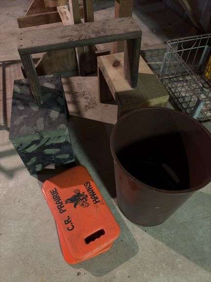 Trash can, bleacher cushions and three wooden step stools