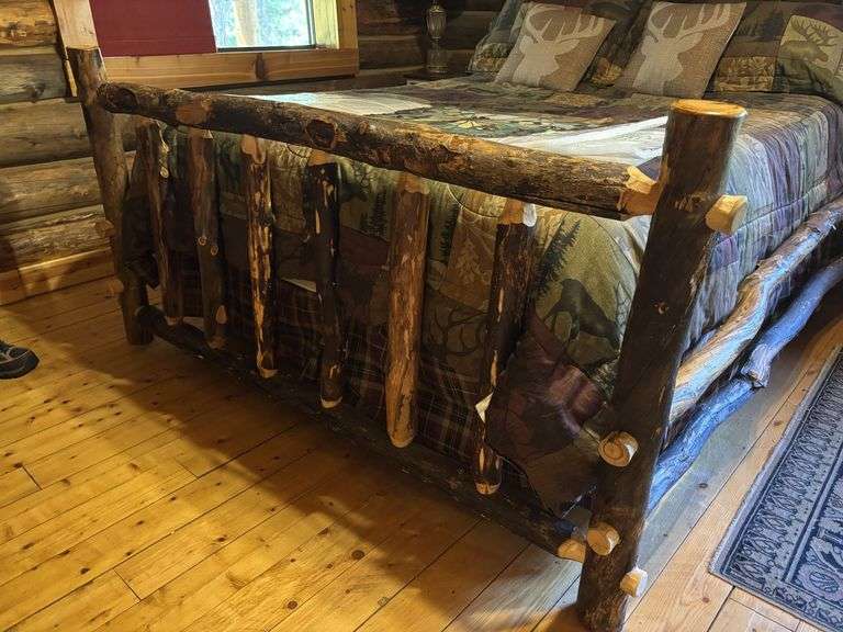 QUEEN sized knotty pine bed frame with mattress box spring and linens