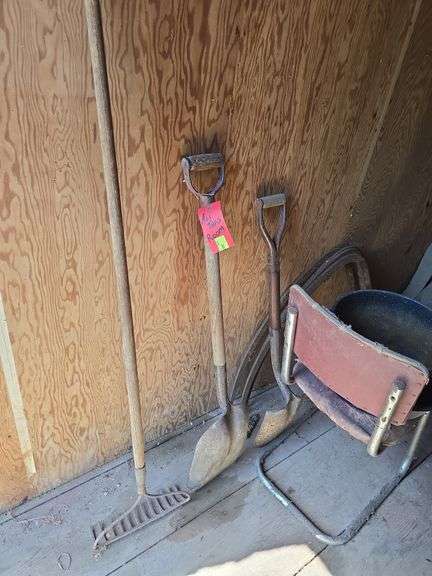 Grapple hay forks, old car tires (3pr), steel wheel, hand crank sheep shear head, old steel baby crib, primitive homemade stilts
