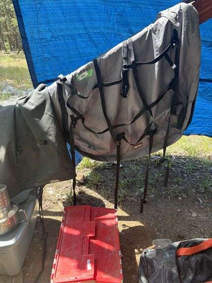 Axius car top carrier, tarps and tote of bags