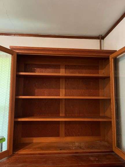 26D x 56L x 90H two piece kitchen cupboard with glass front doors on top and 15 drawers on bottom May need tools to take apart