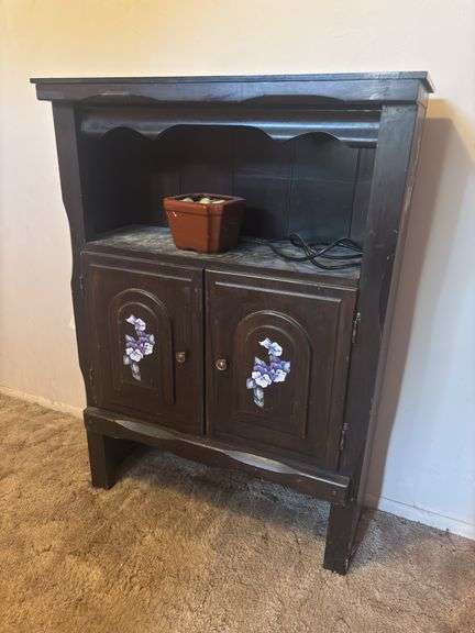 Small cupboard with floral painted design