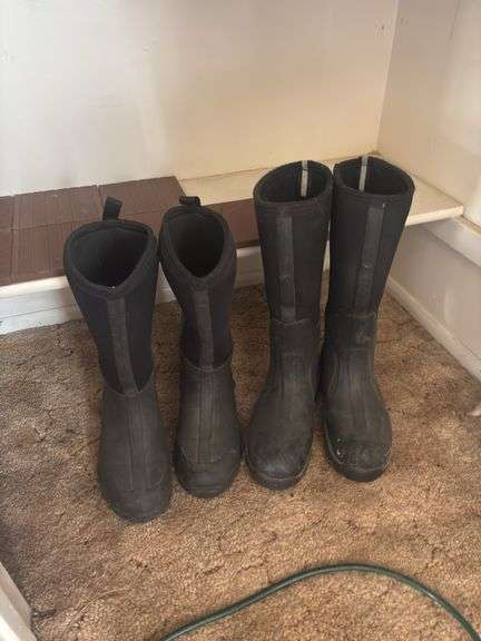 Carhartt size medium Coats overalls and two pair of muck boots men’s seven and eight - these items do come from a smoking home