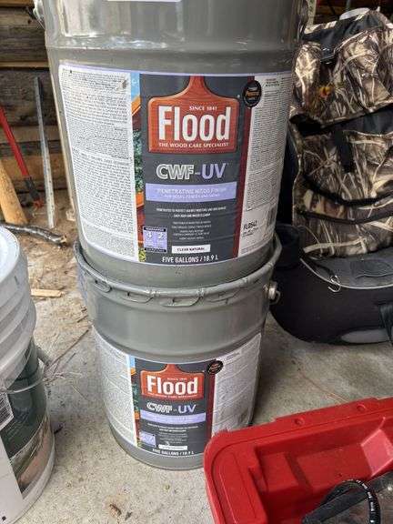 Two buckets of clear wood finish and large lightly used bucket of deck paint