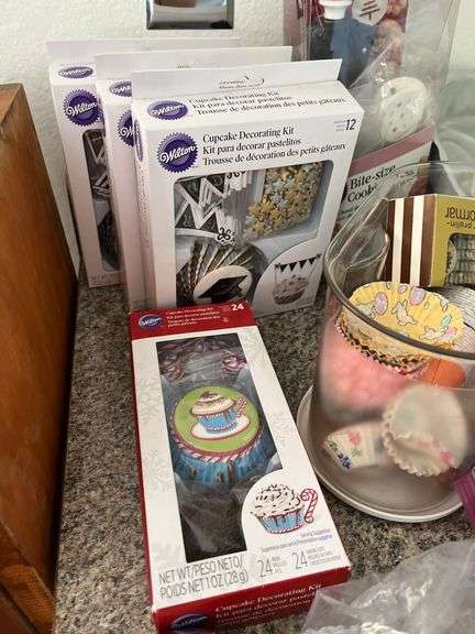 Variety of cake decorating supplies, candies, pans etc...