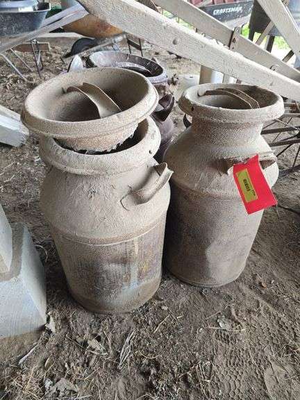 3 more rusty milk cans