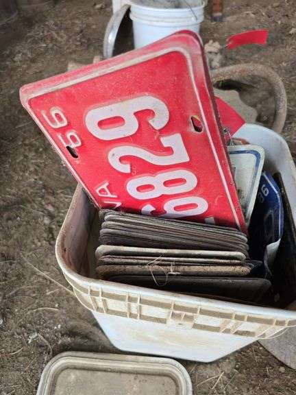 Bucket of license plates 50s and newer