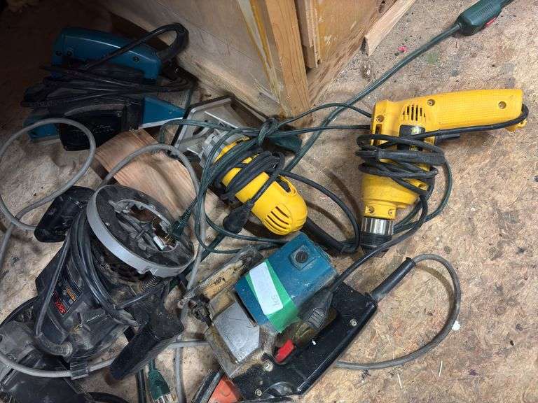 Eight corded hand tools, circular saw, sander, jigsaw, drill, router, wire brush