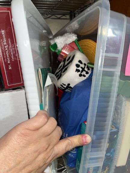 Boxes and boxes of fabric, Christmas, ribbon, decor boxes, paints/brushes, Legos, tins you name it, it's probably here.