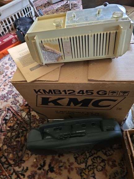 Vintage hair dryers, curlers, clock radio, boombox, fan, NIB KMC 12” portable black & white TV, etc