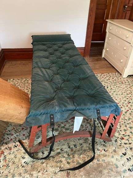Twin size to full size spring bed on wheels with topper