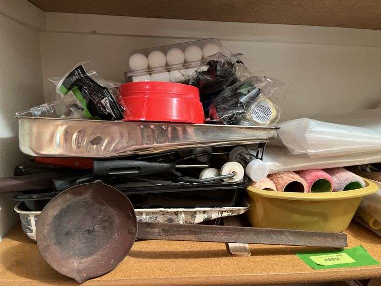 Shelf with painting supplies and other household items