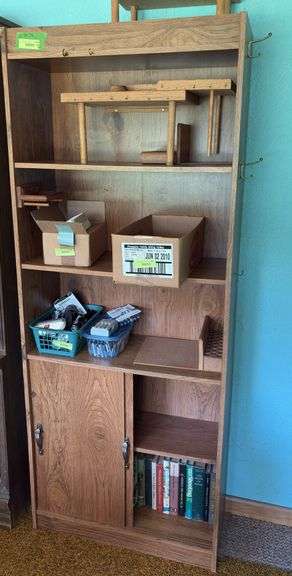 12D x 29L x 72H bookcase and 15D x 50L x 67H entertainment center No contents