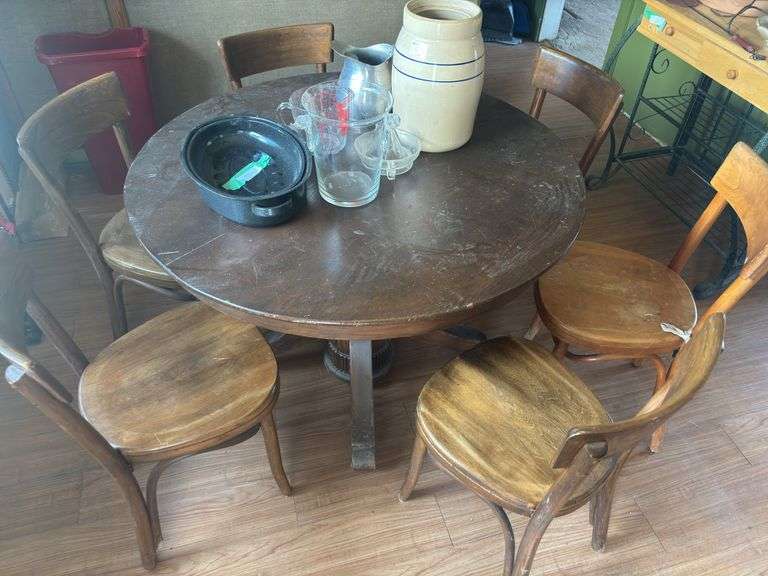 Antique dining room table with 6 chairs