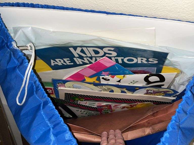 Metal shelf unit, education materials all in closet