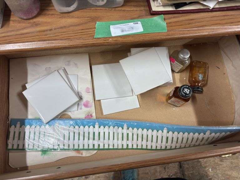 Small dresser, full of painting supplies