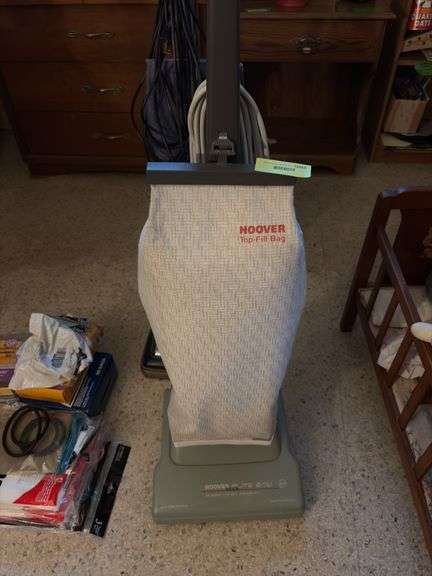 Two vacuums-Hoover Elite and Sanitaire heavy duty