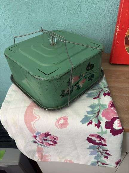 Vintage kitchen items includes Betty Crocker cookbook, serving trays, toaster and cake server