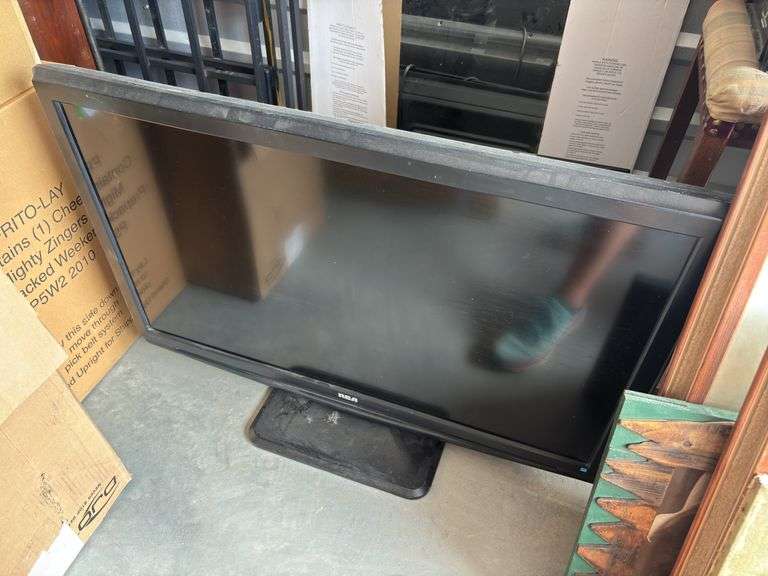 Four flatscreen TVs, all unknown condition, unknown status of remotes