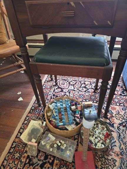 Singer elec sewing machine in stand and sewing notions