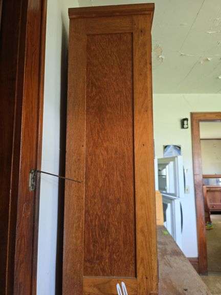 2pc oak cupboard with glass door top and 10 drawer base 26D x 56L x 90H Bring tools to take apart!