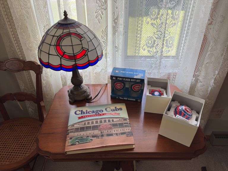 Chicago Cubs items include lamp, book, glasses, ornaments