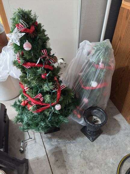 2 small pre-decorated Christmas trees