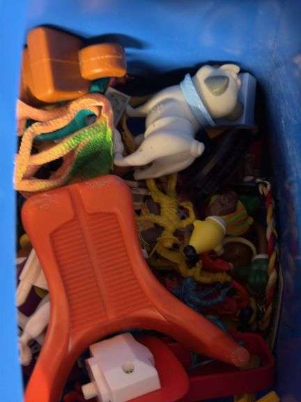 Tote of various toys from the 90's ish