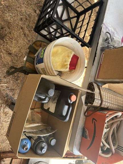 Misc treasures - hummingbird feeder, garden tools, rope, cooler, small propane tanks