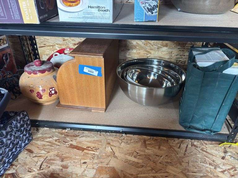 Set of four stainless steel bowls, food saver bags, bread box, cookie jar