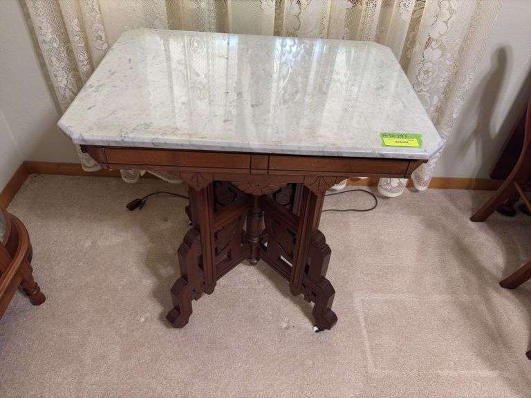 Antique Eastlake style marble top walnut parlor table with original porcelain casters 22 x 30 Per Seller inventory, top was cut from the countertop of old Norway bank