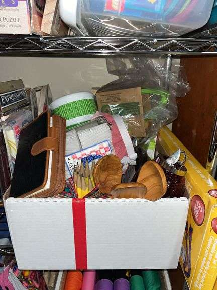 Boxes and boxes of fabric, Christmas, ribbon, decor boxes, paints/brushes, Legos, tins you name it, it's probably here.