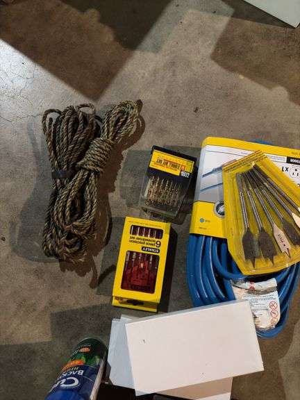 Rope, drop cords, bits, multipurpose plastic boxes, tape measure, bug spray, hooks, etc
