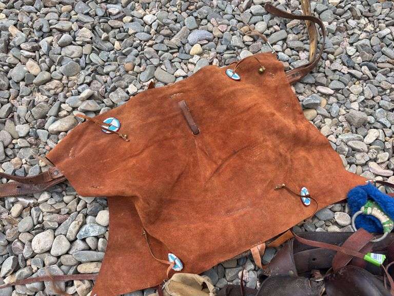 Vintage saddle, chaps, and saddle, blanket with beaded detail