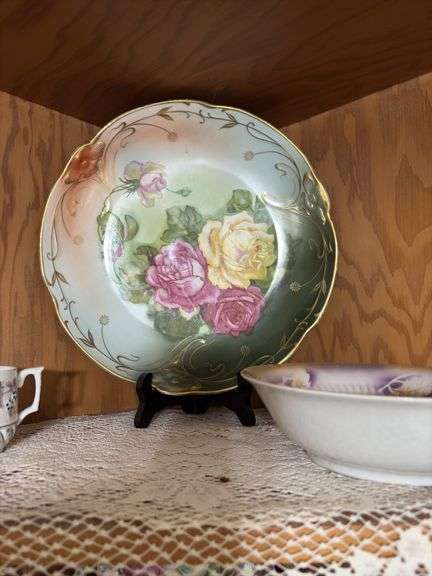 Handpainted china, berry set, juice reamer, pitchers, chamber pot, and more