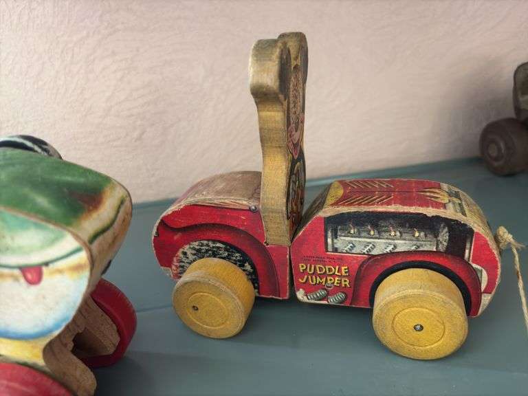 Two FP pull toys-Jolly Jumper and Puddle Jumper