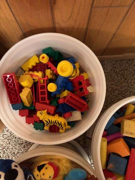 Duplo large Lego blocks, bucket of stuffed animals, bucket of wooden blocks