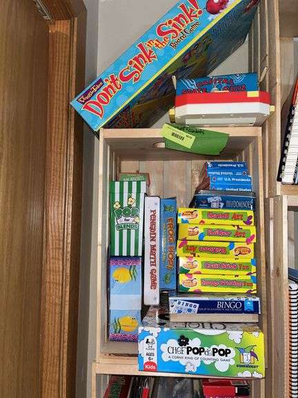 4 wood crates w/ all kinds of games and education materials