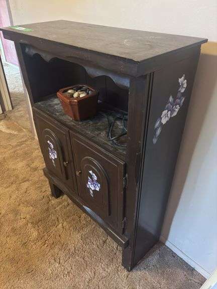 Small cupboard with floral painted design