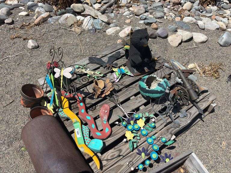Garden art including small Cannon