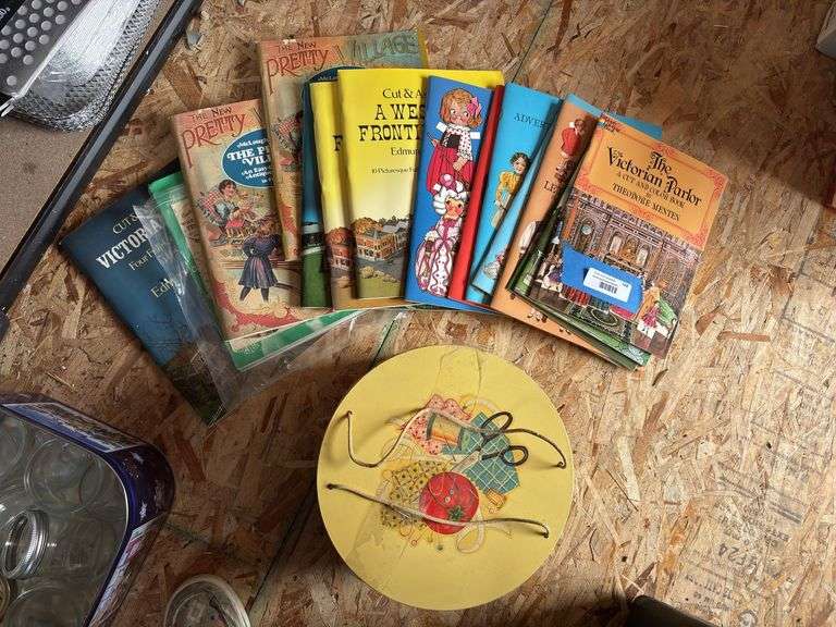 Vintage sewing basket and paper doll books