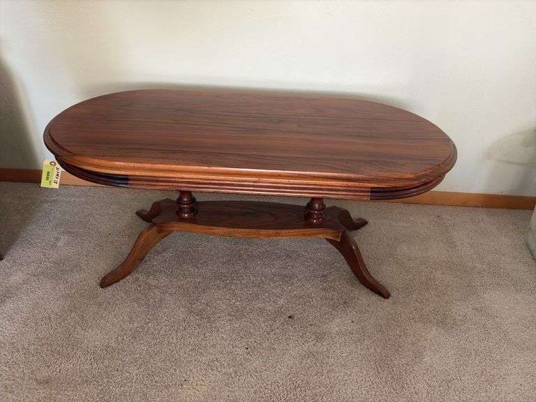 Amana walnut oval coffee table 21 x 44 x 18H
