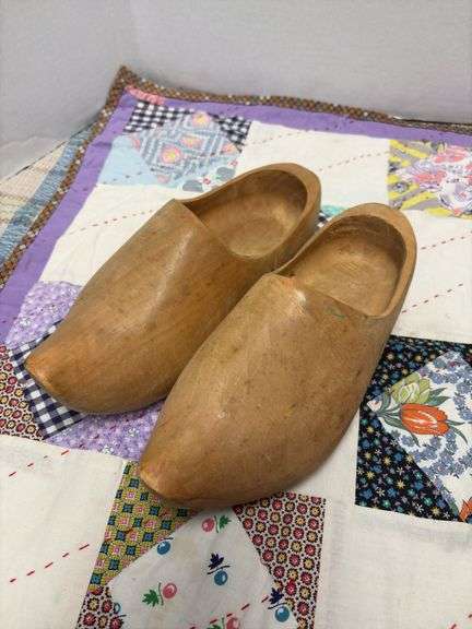 Wooden Dutch shoes and hand sewn doll quilt
