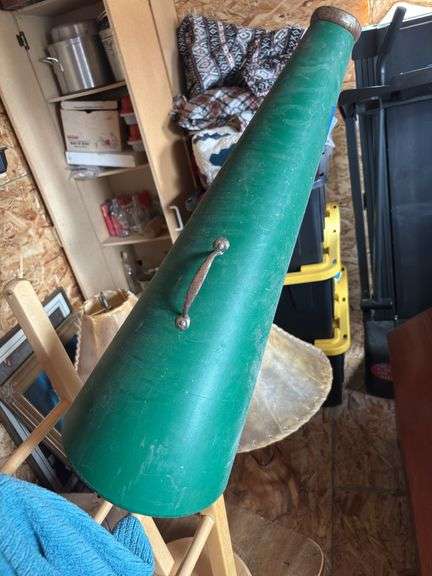 Vintage green megaphone with hawk or eagle emblem