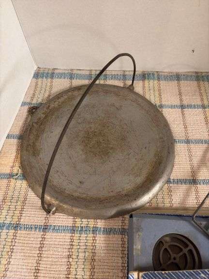 Aluminum griddle and Griswold Patty Molds, box in bad shape