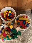 Duplo large Lego blocks, bucket of stuffed animals, bucket of wooden blocks