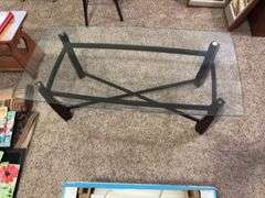 23 x 46 glass top metal legged coffee table