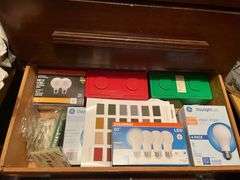 Four drawers of stuff includes extension cords and lots of light bulbs