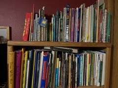2 white metal shelf units, oak bookcase and LOTS AND LOTS of education materials BRING YOUR BOXES