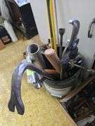 Axe, saw, loppers, crowbar, C clamps etc...